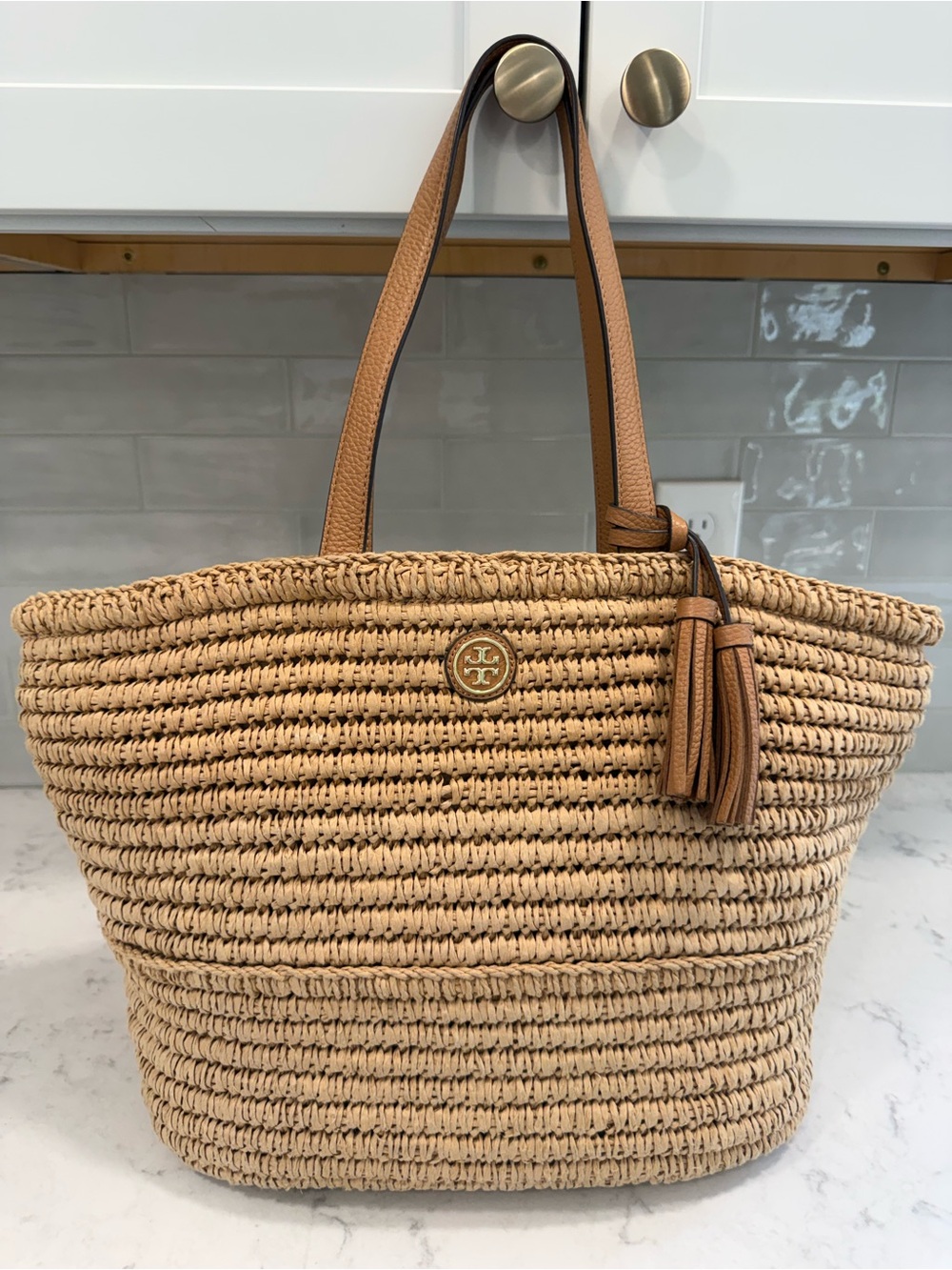 Tory Burch Woven Raffia Tote bag with Leather Tassel Trim in Tan